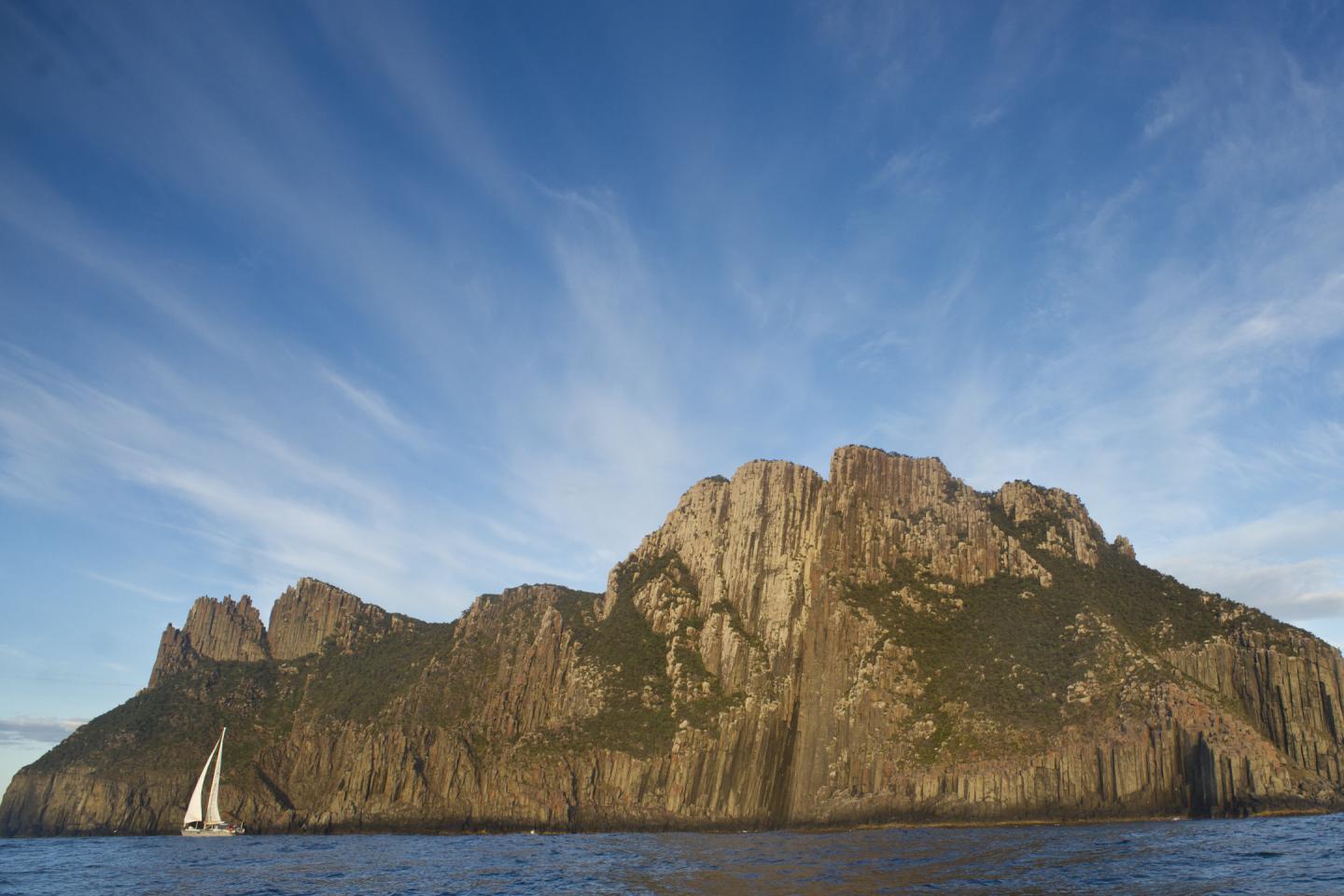 Helsal IV sailing between Tasman Island and Cape Pillar